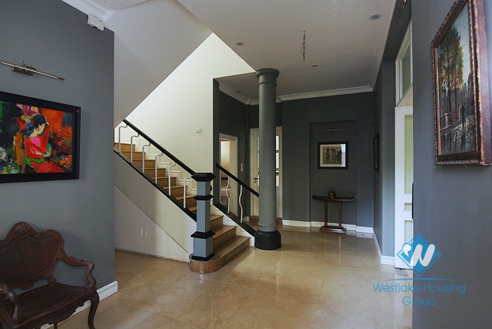 An elegant and high-end villa with a big yard for rent in Tay Ho area